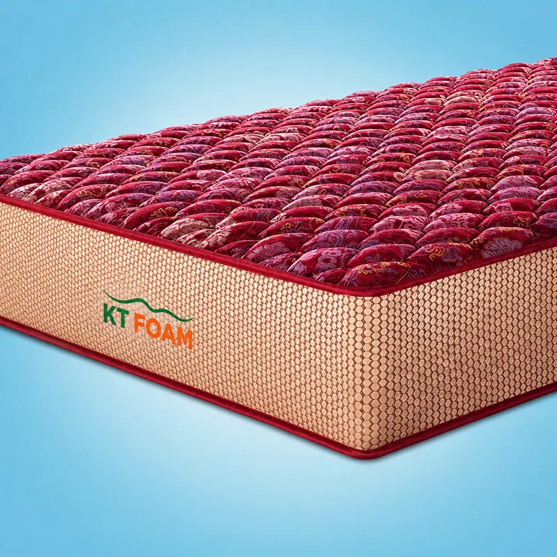Maroon quilted Peps mattress with a woven border, shown against a blue background